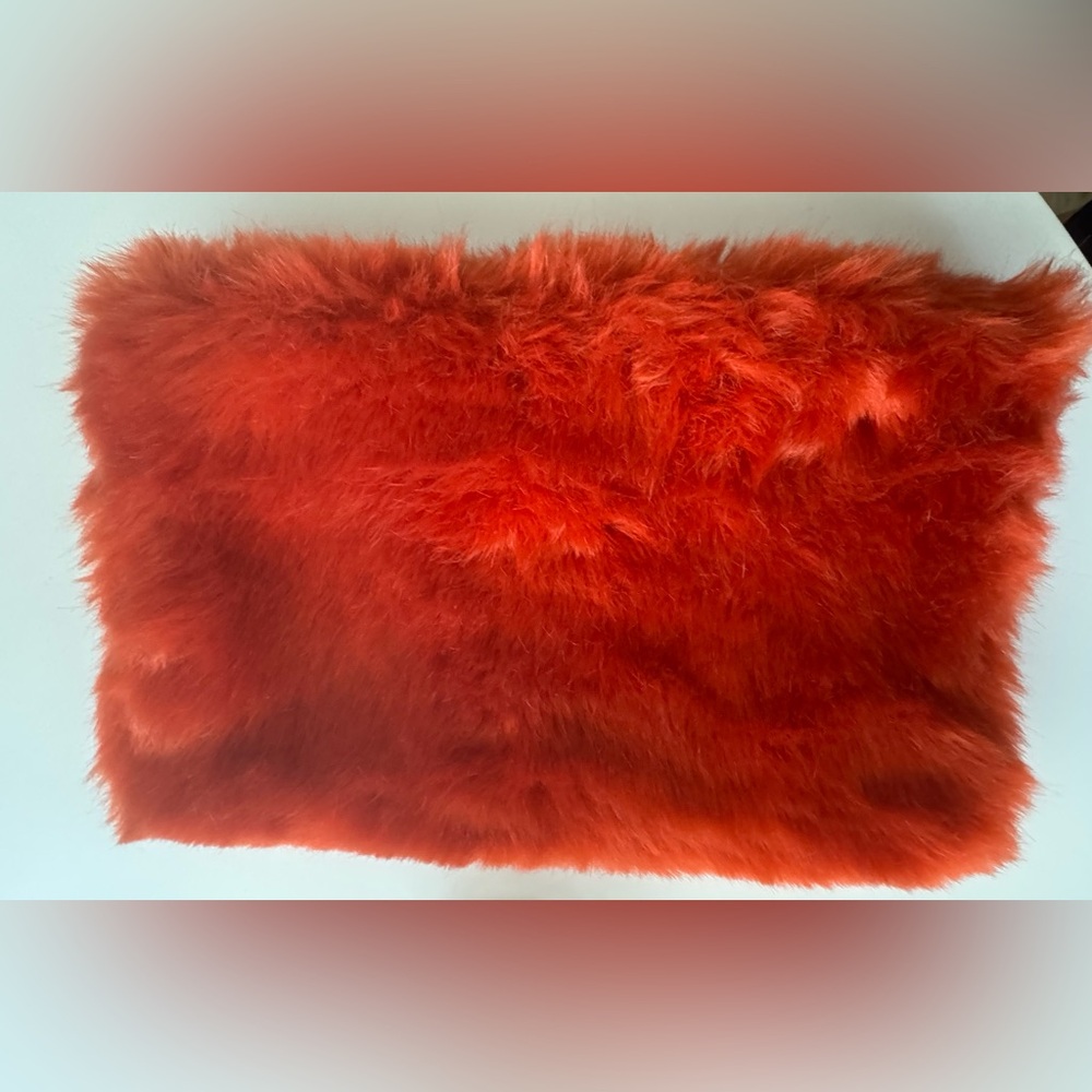 Urban outfitters Orange faux fur clutch